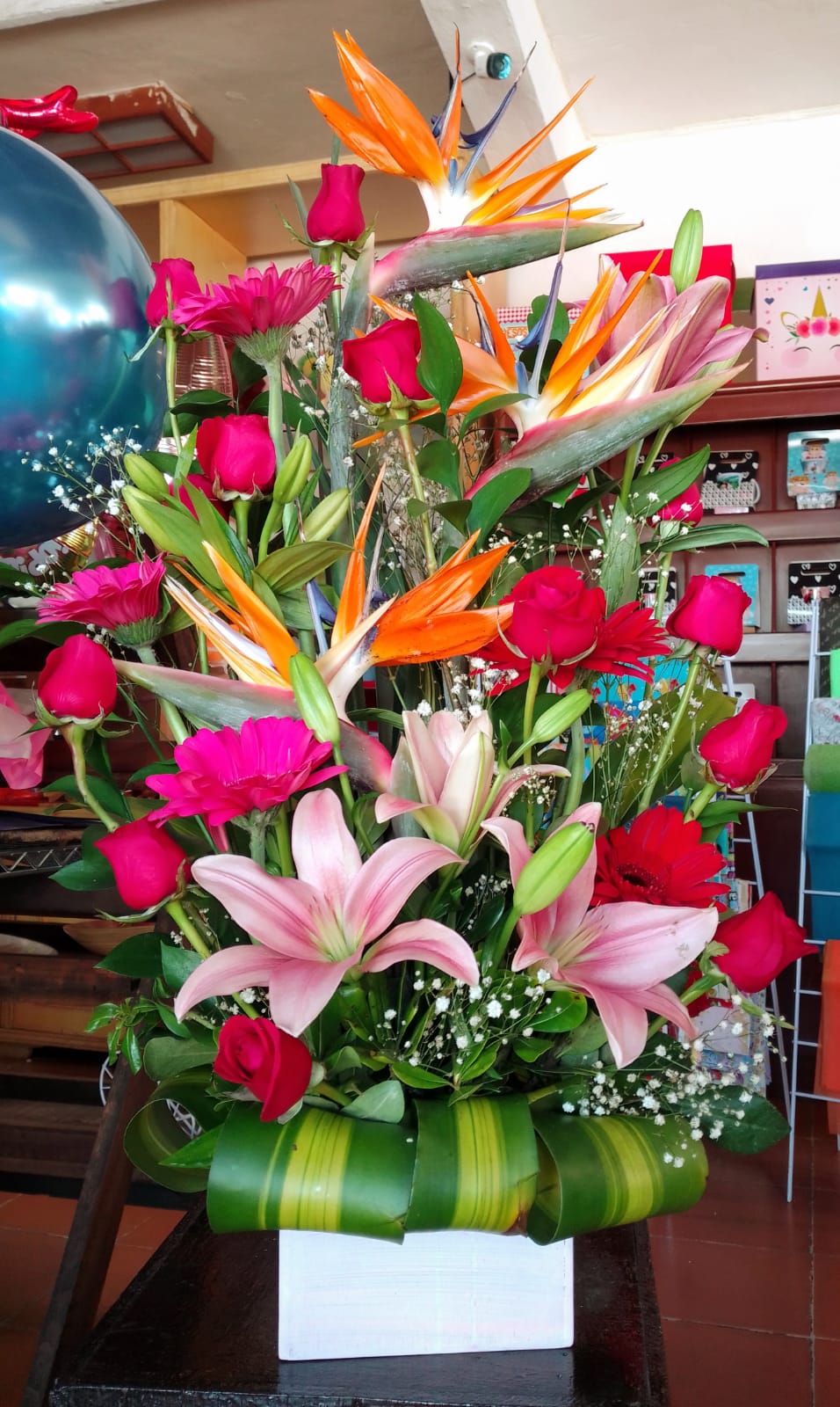 12-Rose Floral Arrangement in Cancun, real catalog photograph